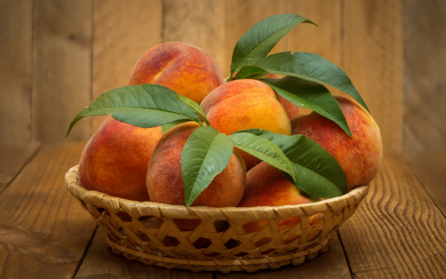 Basket peaches leaves wooden table free wallpaper for desktop - medium preview image