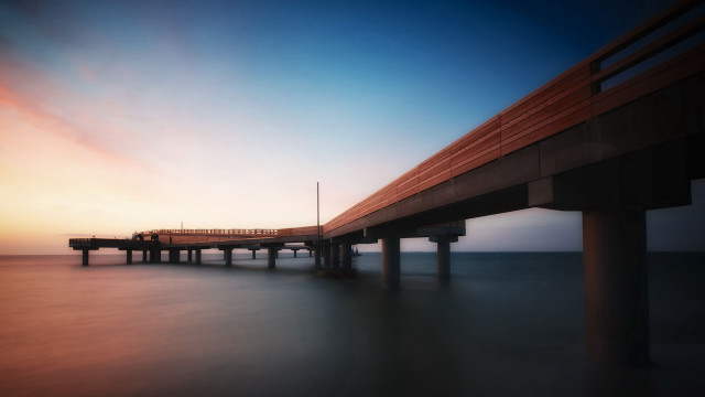 Pier sunset ocean tiltshift longexposure free wallpaper for desktop - medium preview image