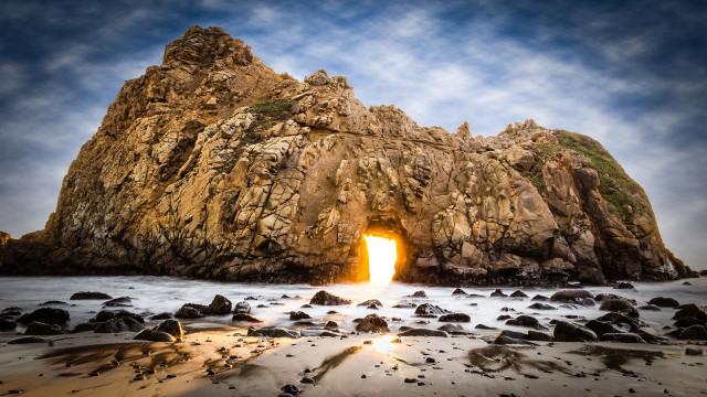 Large rock formation ocean light free wallpaper for desktop - medium preview image