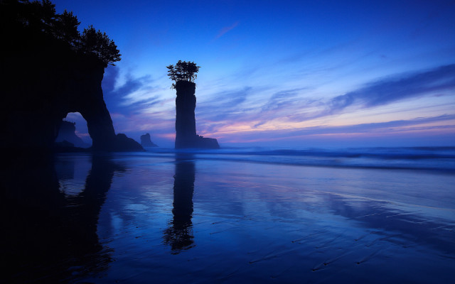 Tall tower beach ocean sunset free wallpaper for desktop - medium preview image
