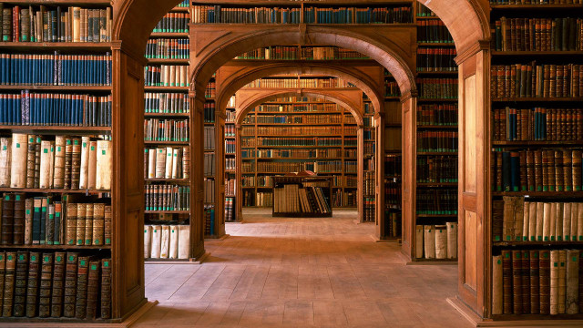 Library archways columns bookshelves medieval free wallpaper for desktop - medium preview image