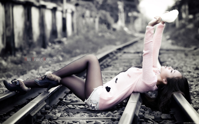 Train track woman blurry fashion free wallpaper for desktop - medium preview image