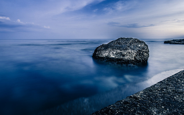 Rock water pier cloudy sky free wallpaper for desktop - medium preview image