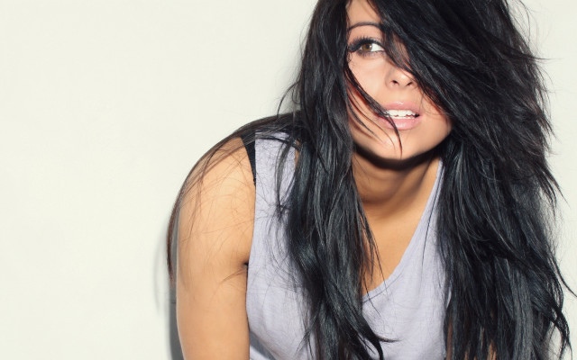 Black hair woman blowing wind free wallpaper for desktop - medium preview image