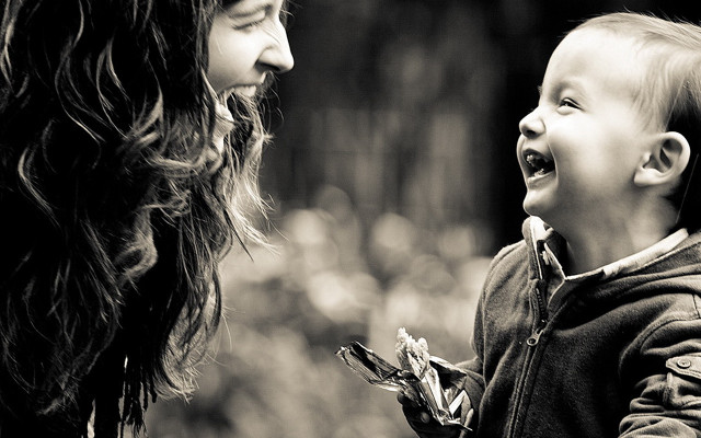 Woman child laughing black white free wallpaper for desktop - medium preview image