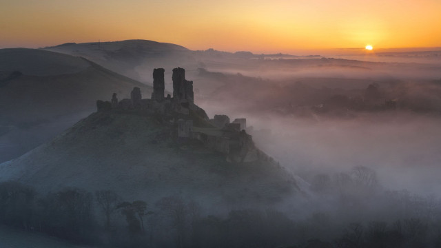 Castle foggy valley sunset clouds free wallpaper for desktop - medium preview image