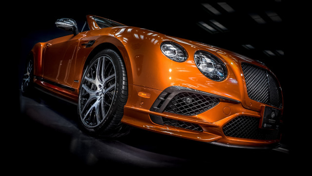 Orange car headlights black background free wallpaper for desktop - medium preview image