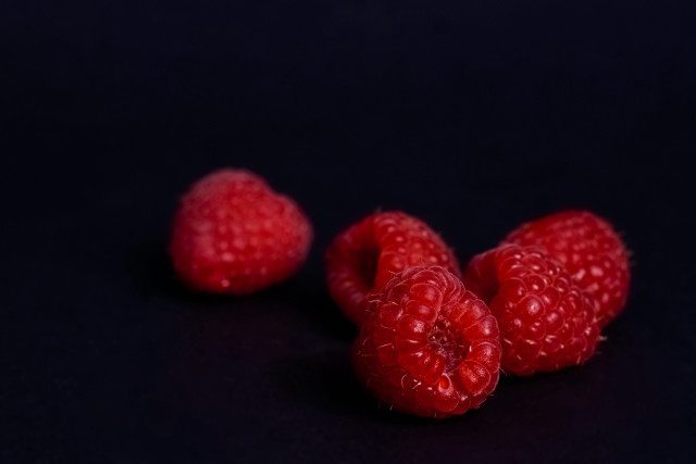 Three raspberries black background macro free wallpaper for desktop - medium preview image
