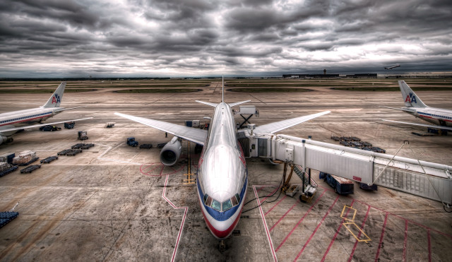 Large jetliner cloudy tarmac tiltshift free wallpaper for desktop - medium preview image