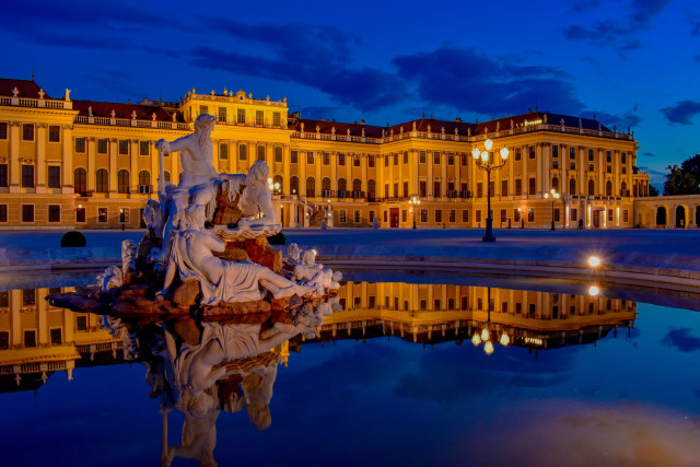 Fountain building clocktower night reflection free wallpaper for desktop - medium preview image