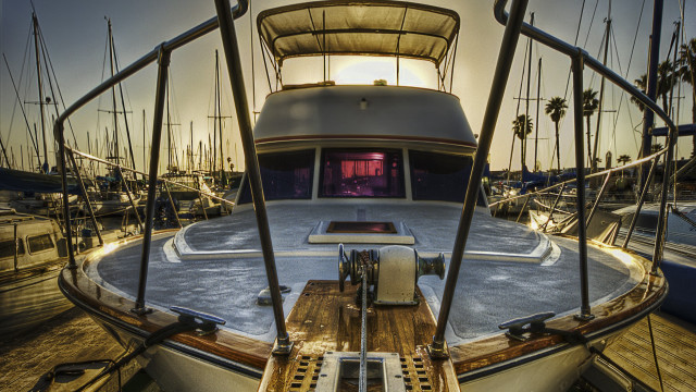 Boat dock sunset cityscape puzzle free wallpaper for desktop - medium preview image