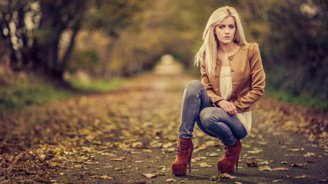 Woman blonde jeans forest portrait free wallpaper for desktop - medium preview image