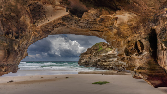 Cave ocean clouds beach rocky free wallpaper for desktop - medium preview image