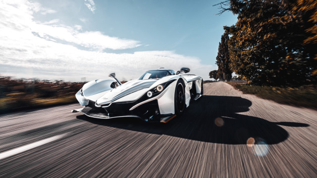 White sports car driving forest #2 free wallpaper for desktop - medium preview image