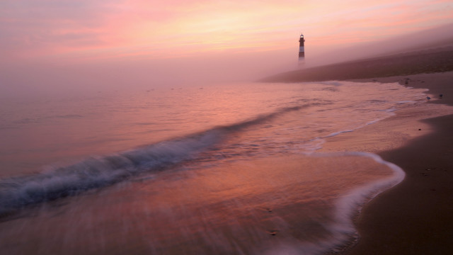 Beach lighthouse wave pink sky free wallpaper for desktop - medium preview image