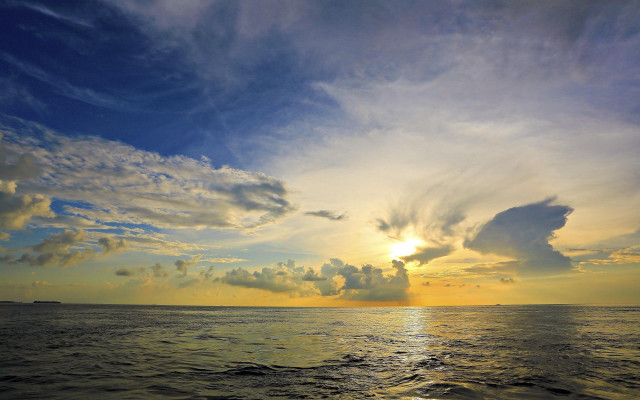 Sunset ocean boat clouds city free wallpaper for desktop - medium preview image