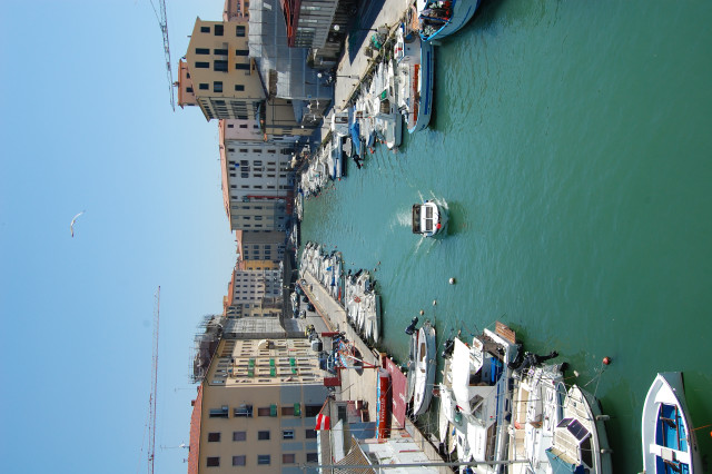 River boats buildings crane cityscape free wallpaper for desktop - medium preview image