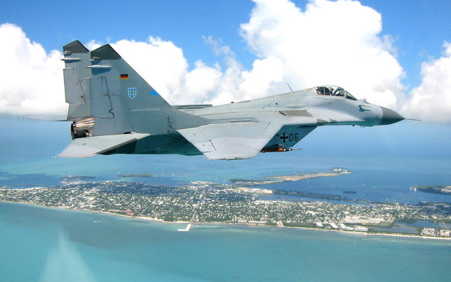 Jet city water sky clouds free wallpaper for desktop - medium preview image