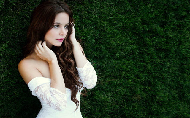 Woman white dress green wall free wallpaper for desktop - medium preview image