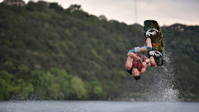 Man flying wakeboard lake forest free wallpaper for desktop - medium preview image