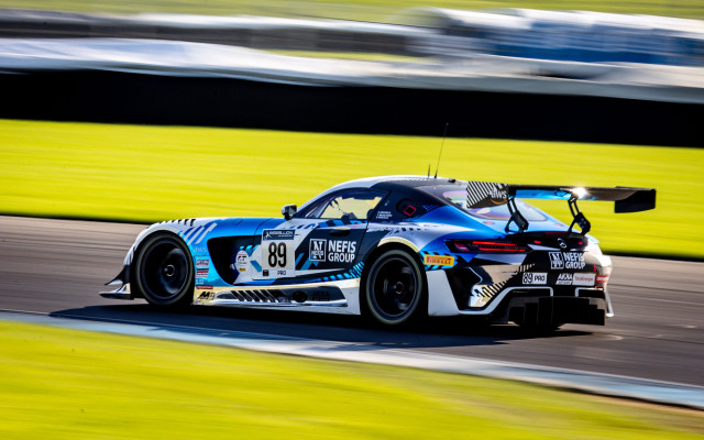 Car race track grass sky free wallpaper for desktop - medium preview image