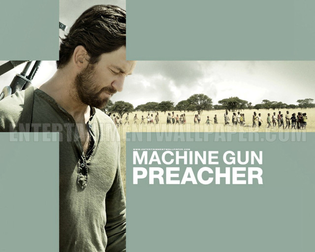 Man gun cross chest front free wallpaper for desktop - medium preview image