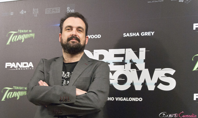 Man standing black wall arms free wallpaper for desktop - medium preview image