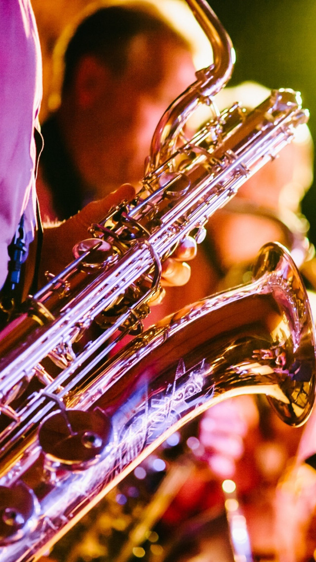 Close up person playing instrument free wallpaper for mobile - medium preview image