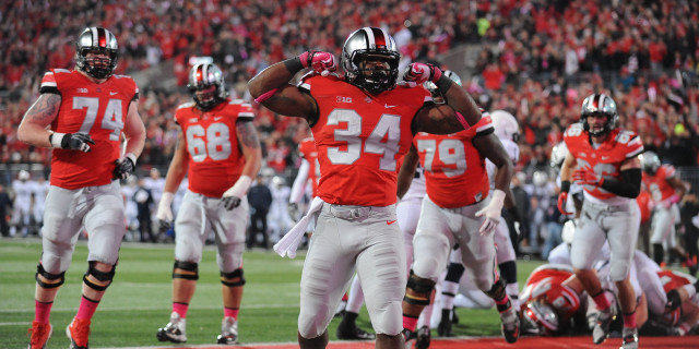 Football player celebration teammates crowd free wallpaper for desktop - medium preview image