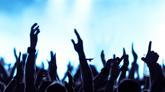 Concert crowd hands up blue free wallpaper for desktop - medium preview image