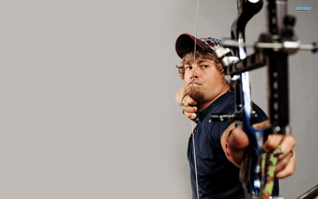 Man holding bow aiming gun free wallpaper for desktop - medium preview image