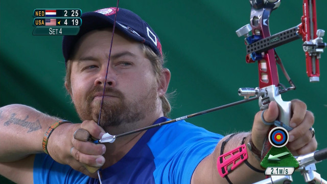 Man beard bow aiming target free wallpaper for desktop - medium preview image