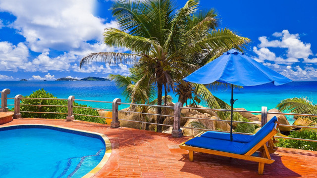 Blue lounge chair pool ocean free wallpaper for desktop - medium preview image