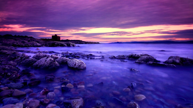 Purple red sky rocky beach free wallpaper for desktop - medium preview image