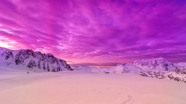 Purple sky snowy mountains skier free wallpaper for desktop - medium preview image