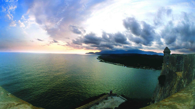 Cliff top water view cloudy free wallpaper for desktop - medium preview image