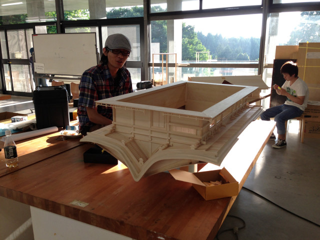 Man working model building workshop free wallpaper for desktop - medium preview image