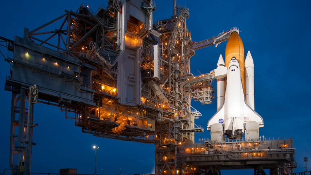 Space shuttle building platform night free wallpaper for desktop - medium preview image