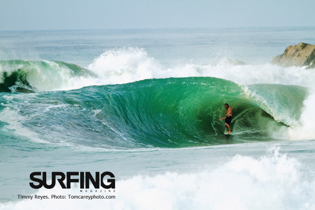 Surfing ocean rock beach sky free wallpaper for desktop - medium preview image