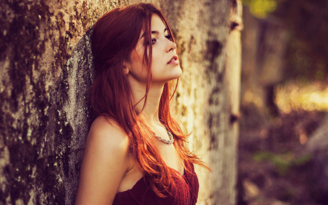 Redhair woman leaning wall autumn free wallpaper for desktop - medium preview image