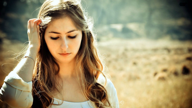 Woman field serious hands hair free wallpaper for desktop - medium preview image