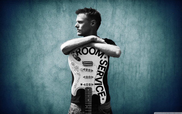 Man holding guitar shirt moon free wallpaper for desktop - medium preview image