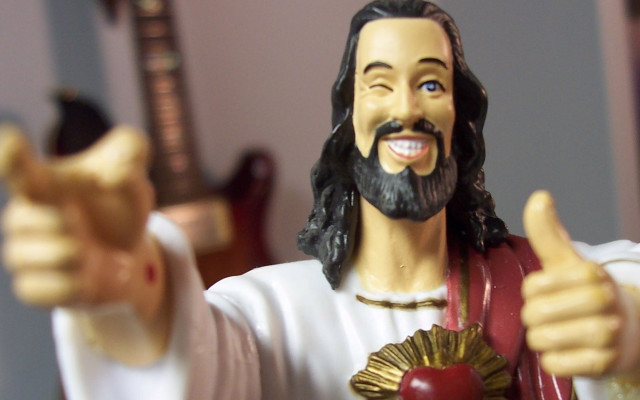 Jesus statue golden apple thumbs free wallpaper for desktop - medium preview image