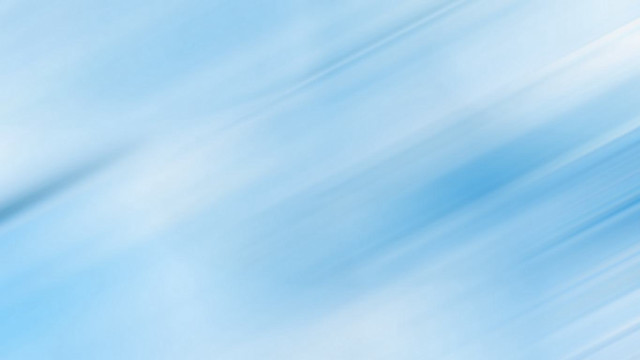 Blurry snowboarder air sky blue free wallpaper for desktop - medium preview image