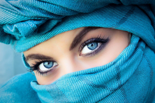 Blue eyes woman serious look free wallpaper for desktop - medium preview image