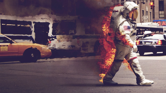 Man space suit fire building free wallpaper for desktop - medium preview image