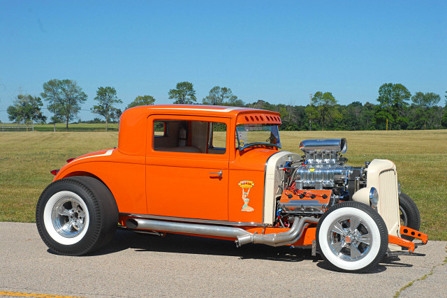 Orange car parked road engine free wallpaper for desktop - medium preview image