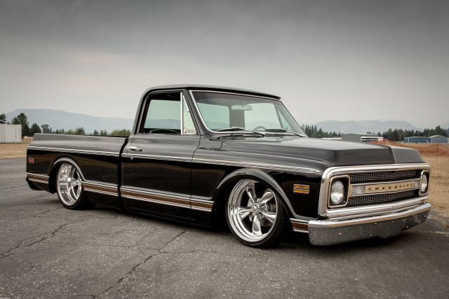 Black truck parking lot grass free wallpaper for desktop - medium preview image