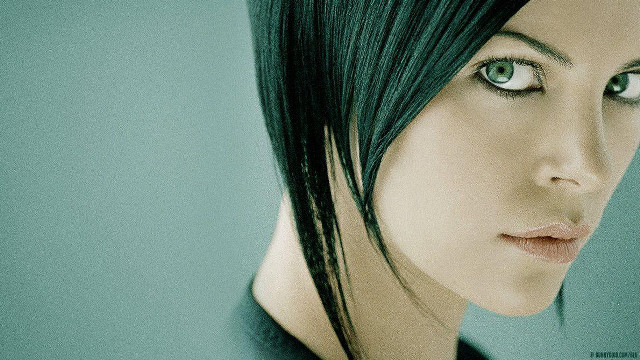 Green haired android serious portrait free wallpaper for desktop - medium preview image