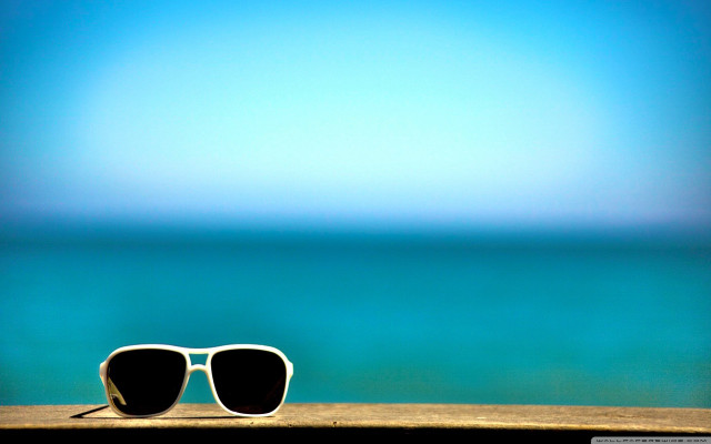 Sunglasses ocean ledged blurry blue free wallpaper for desktop - medium preview image